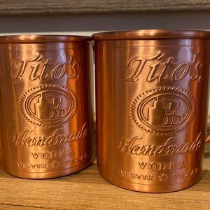 5 Very gently used, official Tito's vodka, all copper Moscow mule mugs. $25 each